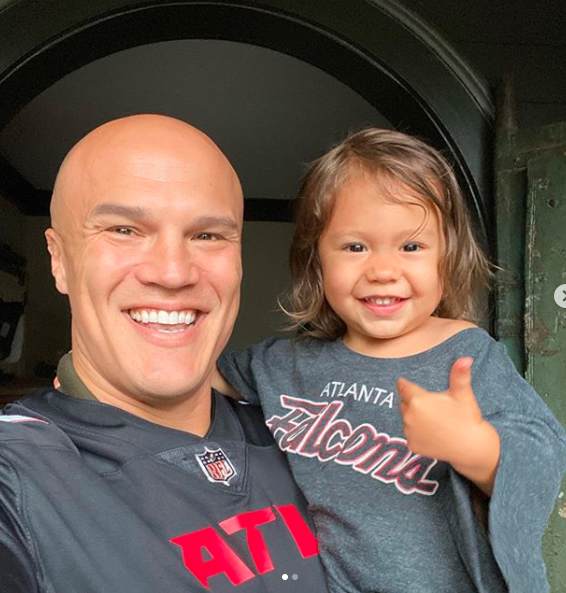 Claire's first daughter, Wrenn Annette Wire, 2, with her husband, Coy.